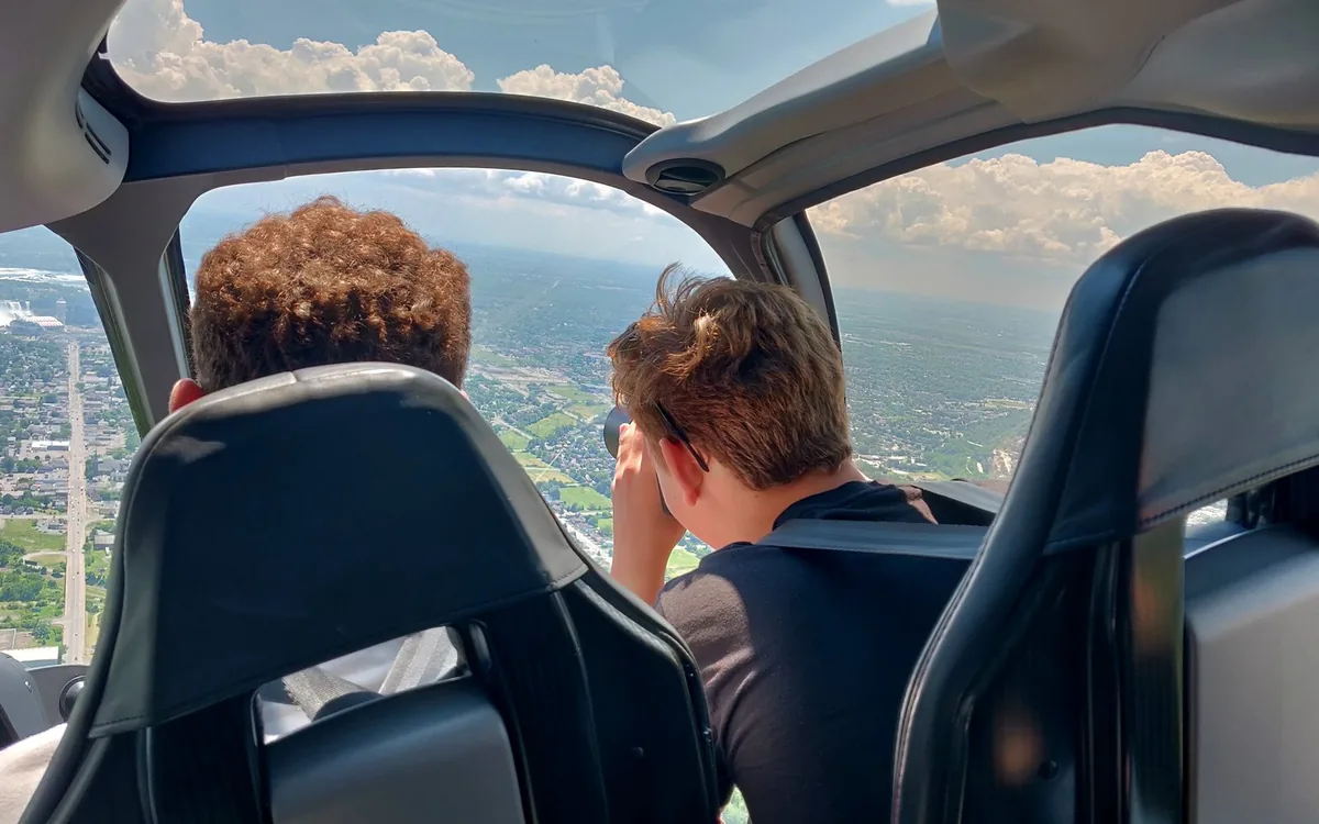 The view from inside a helicopter cabin over the city