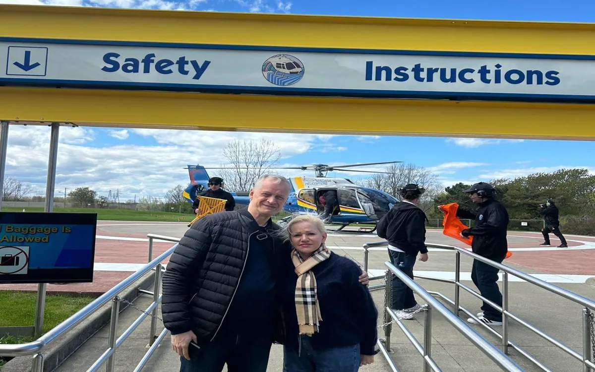 Passengers at the safety briefing before a helicopter flight